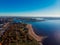 Stadium St. Petersburg. Zenit-Arena. Gulf of Finland. Clear autumn day. Blue sky. Pedestrian bridge. Highway. Top view.