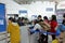 Staff checking ticket at the entrance of new railway station