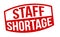 Staff shortage grunge rubber stamp