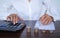 Staff woman check amount numeric book bank account