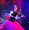 On stage - beautiful, frail and slender girl with fiery red hair - a well-known musician, virtuoso violinist Maria Bessonova.