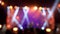 Stage lights at the music festival, colorful defocused background