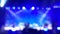 Stage moving lights at the musical festival, defocused background