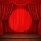 Stage with red curtain, wooden flooring and spot light