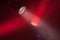 Stage spot lights with red beams in smoke