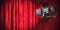 Stage or studio spotlight on red curtain background. Lighting equipment for Studio photography or videography