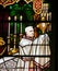Stained Glass - a bishop holding a Monstrance