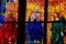 A stained glass mosaic window of religion church