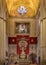 Stained Glass, Painting and Silver Altar of the Cathedral of Seville in Seville, Andalusia, Spain.