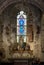 Stained glass in Saint Pierre parish church. Mont Saint Michel, France