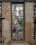 Stained glass window with iconic Dallas sports figures at Dot`s Hop House & Cocktail Courtyard in Deep Ellum, Texas.