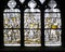 Stained glass window in yellow grey and gold. CollÃ©giale Notre-Dame church in Beaune.