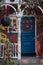 Stained glass on a wooden door of a traditional Victorian house in London, UK, selective focus