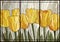 Stained glass yellow tulips in frame