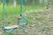 Stained and rusty horse swing on a playground park