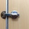 Stainless bolt the doors locked of restroom in hotel.