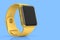 Stainless gold smart watch or fitness tracker isolated on blue background.