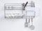 Stainless shelf with kitchen utensil
