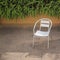 Stainless steel chair in a garden