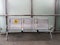 Stainless steel chairs in the train station with disabled signage to facilitate the use of train services for the disabled