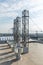 Stainless steel chimneys and baffles on the roof of the building