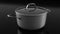 Stainless steel cooker with lid and chrome plated aluminum cookware on black