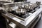 stainless steel cooking station with induction burner and pots and pans