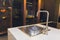 Stainless steel crane and marble countertop