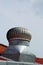 Stainless steel exhaust fan on roof with blue sky