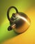 Stainless steel kettle on yellow and green background