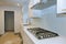 Stainless steel kitchen sink and modern kitchen interior with new oven kitchen in the apartment