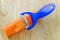 Stainless steel knife slicer tool in blue shredding carrot