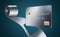 A stainless steel metal credit card is seen with a coil of sheet steel and you can see where the card has been punched out of the