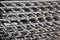 Stainless steel metal grilles stacked. Selective focus. Home inventory, design,