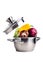 stainless steel saucepan with vegetables and a levitating glass lid on a white background. Close-up