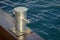 A stainless steel ship marine bollard close-up