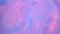 Stains of blue and pink ink on the water. Abstract colored background footage. Fluid design, perfect for motion graphics