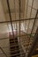 Stair case with safety cage in HMP Shrewsbury, an abandoned prison