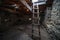 A staircase between floors inside. the foot of the mountains of the watchtowe. Interior Tower of Love in Svaneti in the mountains