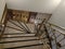 staircase with gilded rich railings close up