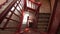 Staircase red paint four stories in tenement build in new york city