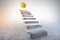 Staircase to gold dollar coin, financial success