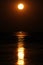 Staircase to the moon phenomenon, moon-rise reflected in the water & mud flats near Broome