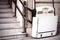 Stairlift on staircase for elderly people and disabled persons