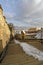 Stairs alley between stone walls