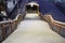 Stairs on the boardwalk covered with fresh snow without footsteps