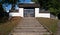 Stairs and cemetery gate in Oravsky Biely Potok