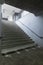 Stairs of a concrete railway station in Switzerland leading to the pedestrian underpass