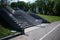 Stairs with concrete steps and shiny metal railings