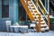 Stairs covered snow house in suburbs in winter